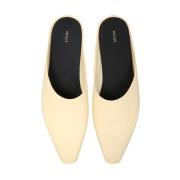 Mule alba slip-ons