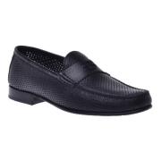 Loafer in black perforated calfskin