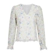 Bluse med broderi og blomsterprint