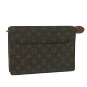 Pre-owned Canvas clutches