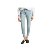 Faded Skinny Jeans med Metal Knap