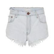 Højtaljede denim shorts skåret