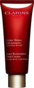 Clarins Super Restorative Hand Cream 100 ml. 100 ml - Håndcreme hos Ma...